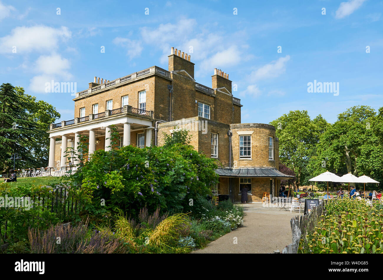The historic Clissold House, Clissold Park, Stoke Newington, North London, in summertime with people outside Stock Photo