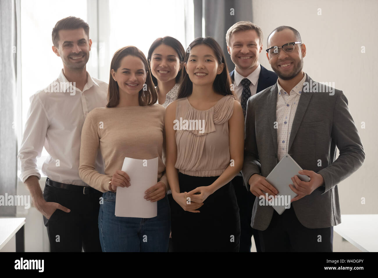 Multicultural teammates hi-res stock photography and images - Alamy