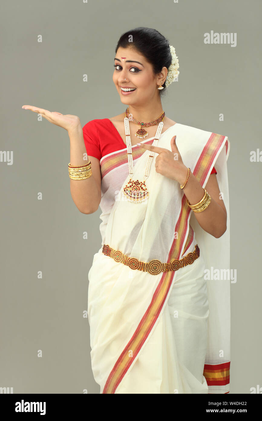 South Indian woman smiling and gesturing Stock Photo - Alamy
