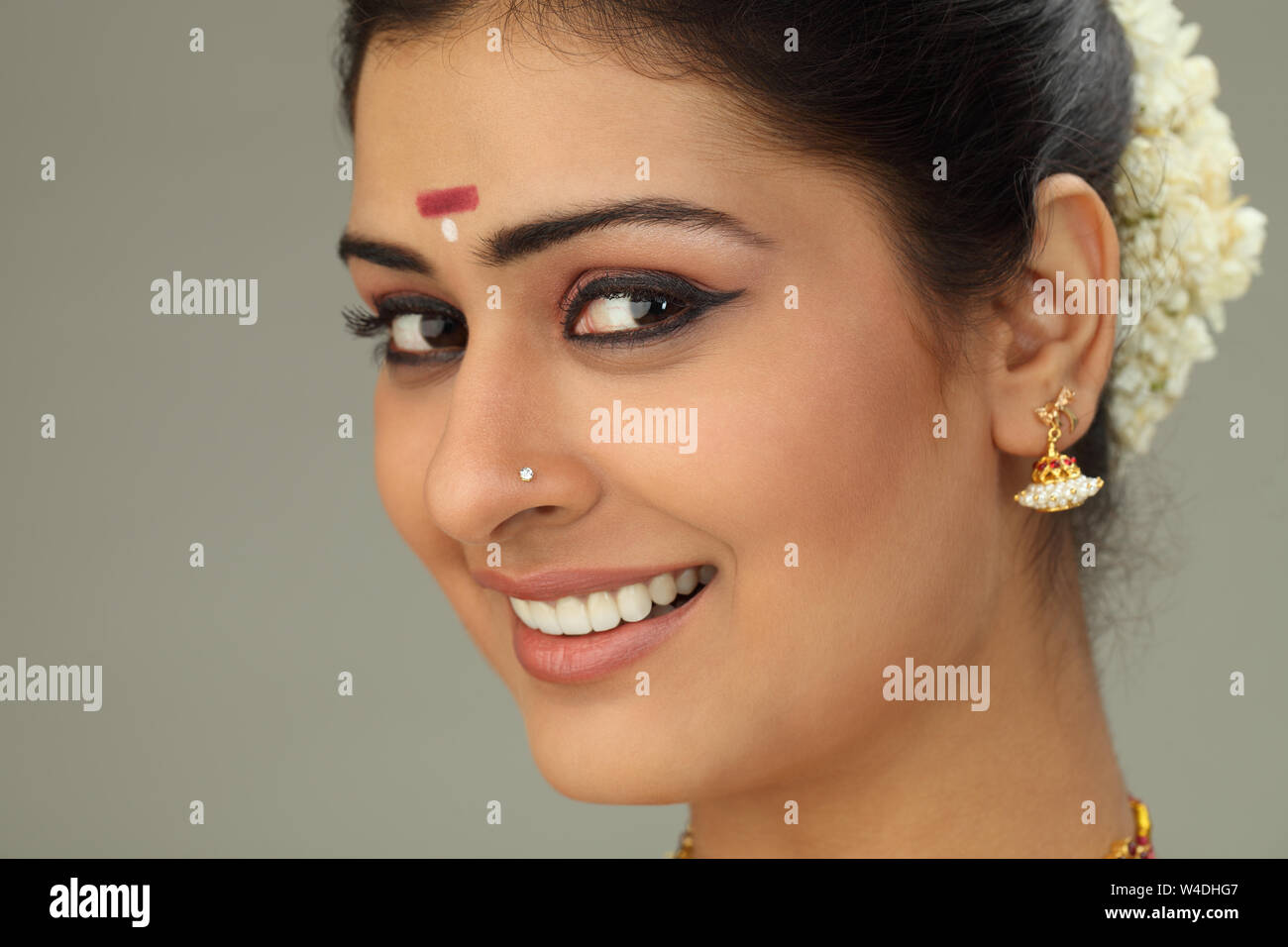 Close up of a south Indian woman smiling Stock Photo - Alamy