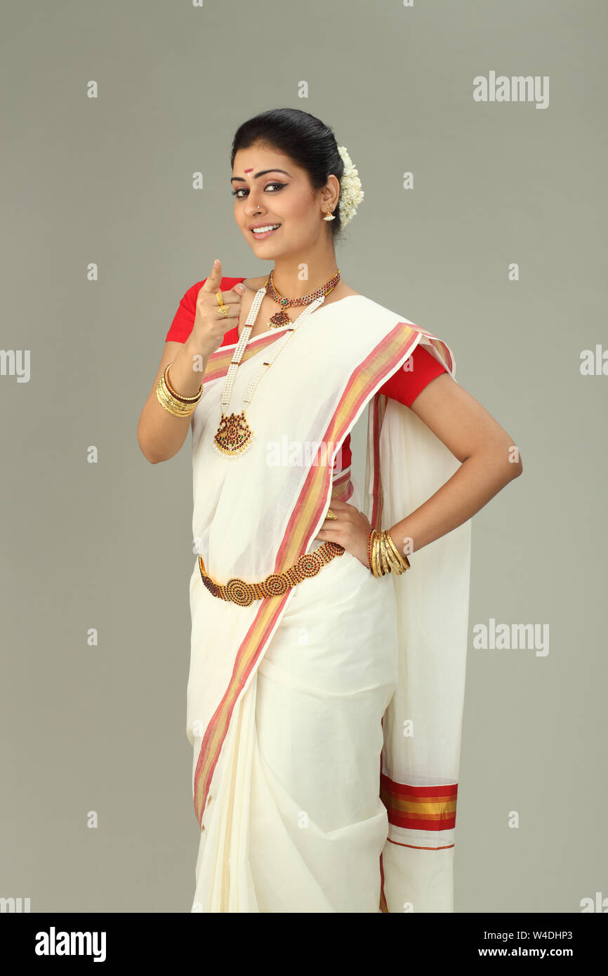 South Indian woman smiling and gesturing Stock Photo - Alamy