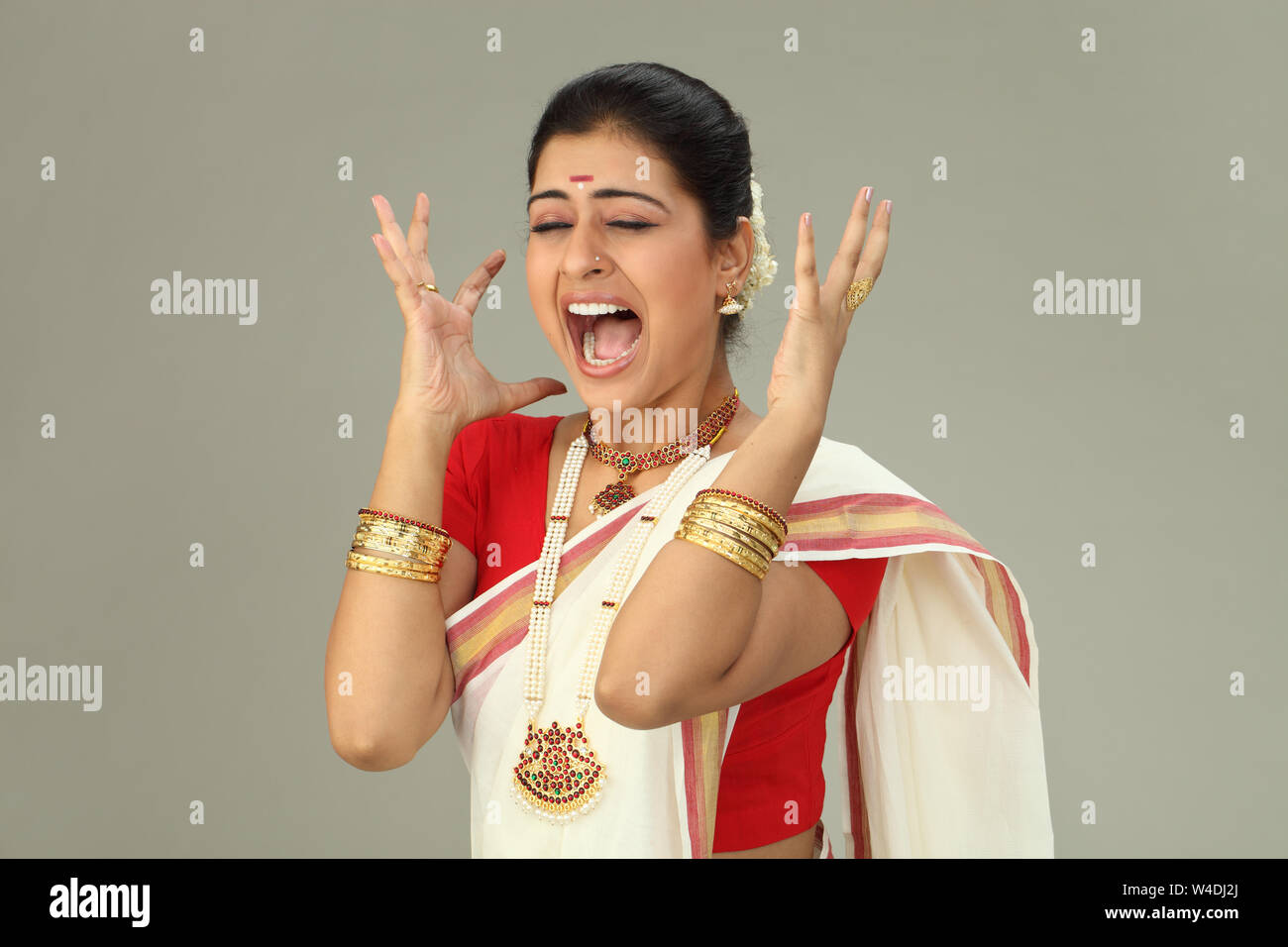 South Indian woman gesturing Stock Photo - Alamy