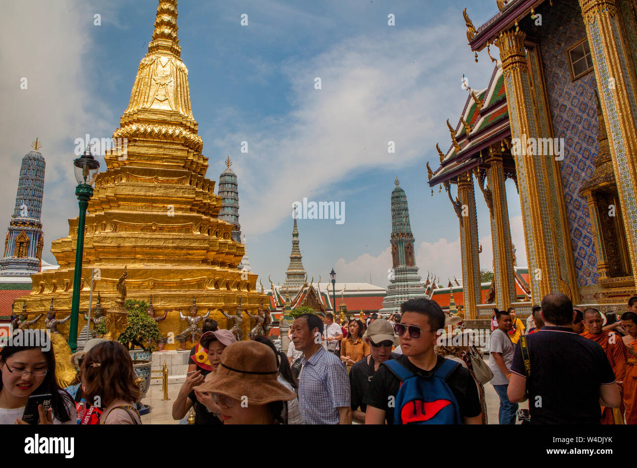 Crowds of people touring the Grand Palace in Bangkok, Thailand. Stock Photo