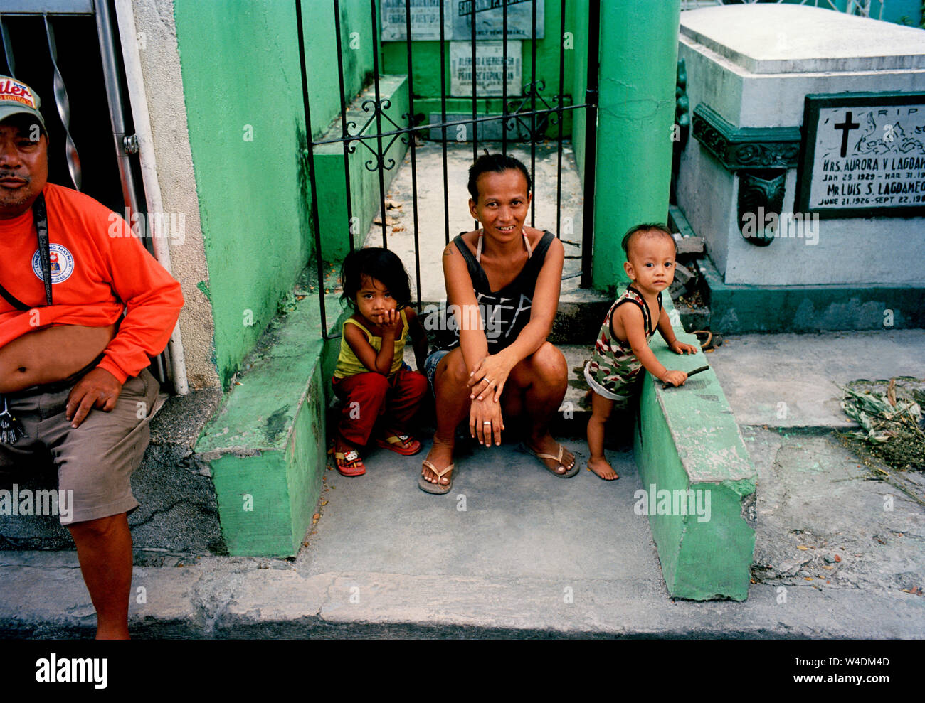 People who live amongst the graves in Manila North Cemetery in Manila