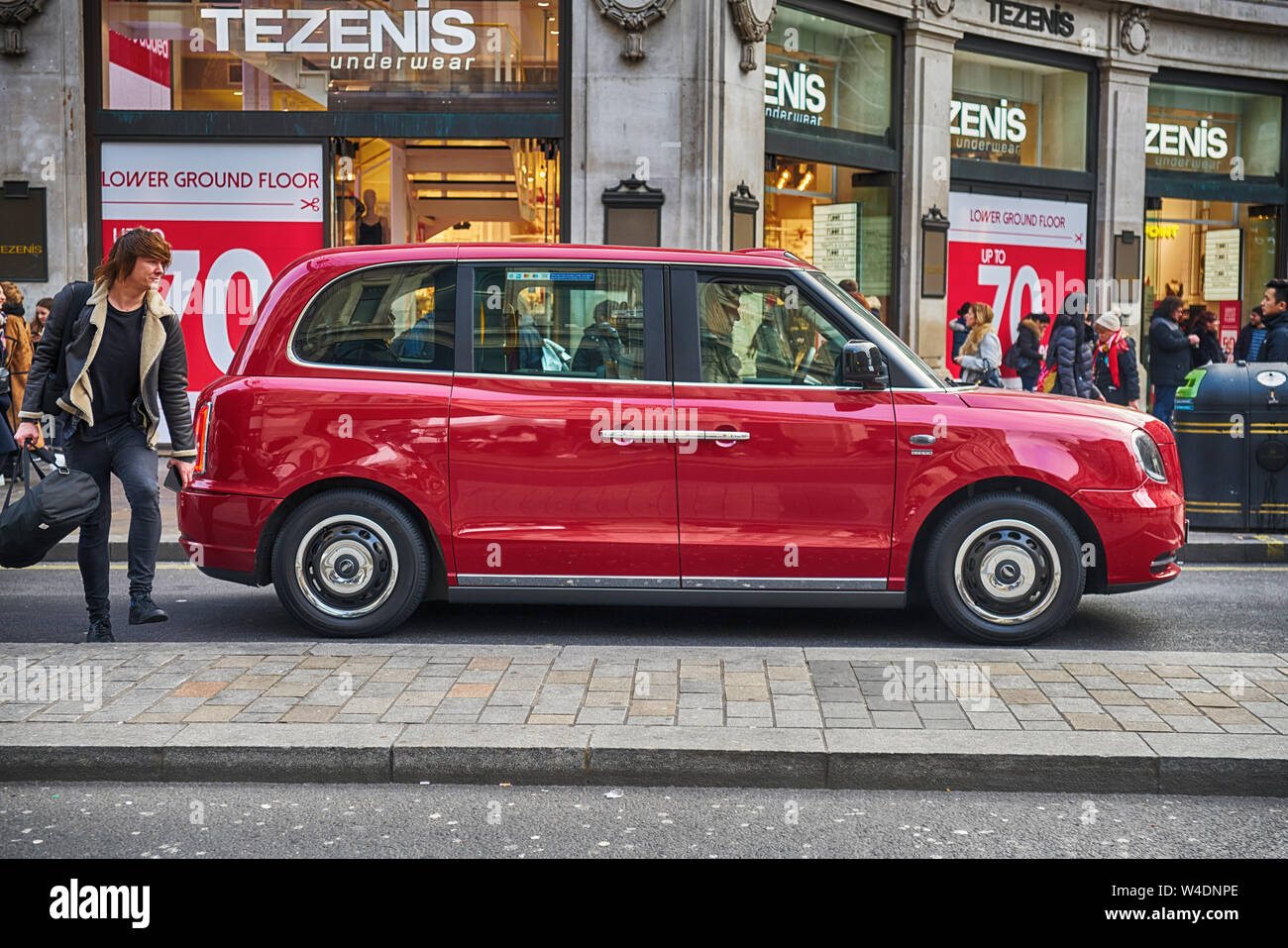 electric taxi oxford street   red taxi Stock Photo