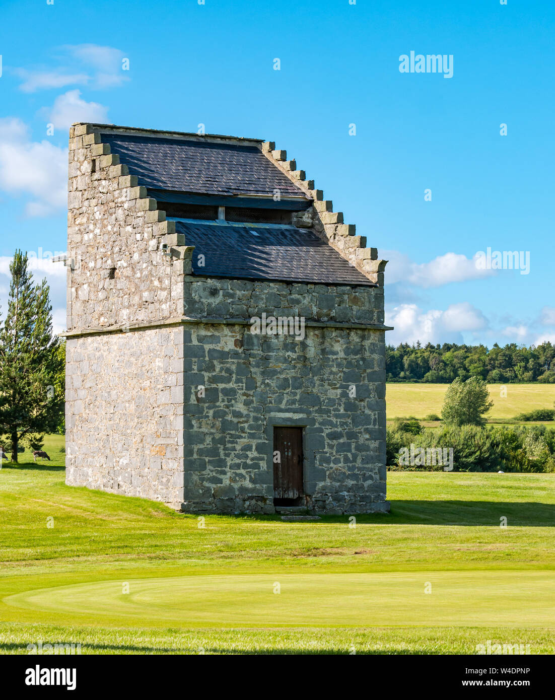 Old tower dovecote on golf green, Forrester Park Resort Golf Course, Fife, Scotland, UK Stock Photo