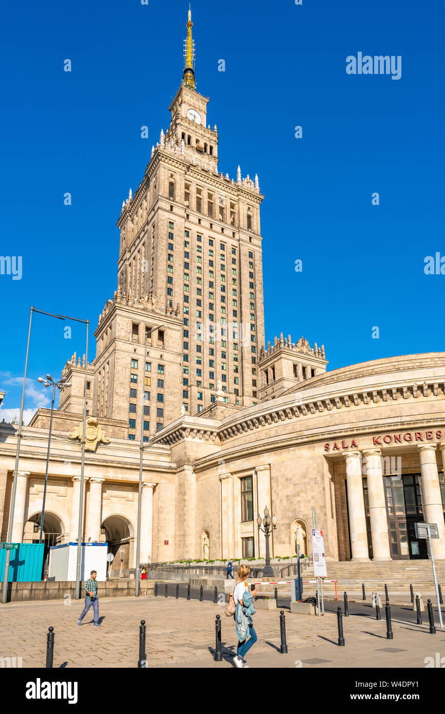 WARSAW, POLAND - JULY 18, 2019: Palace of Culture and Science in capital of Poland was constructed in 1955 and since 2007 it has been enlisted in the Stock Photo