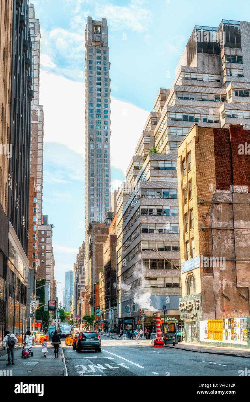 New York City/USA -May 25, 2019  Street Scene and Apartment Buildings of Midtown Manhattan in  Sunny Daylight, NYC Stock Photo