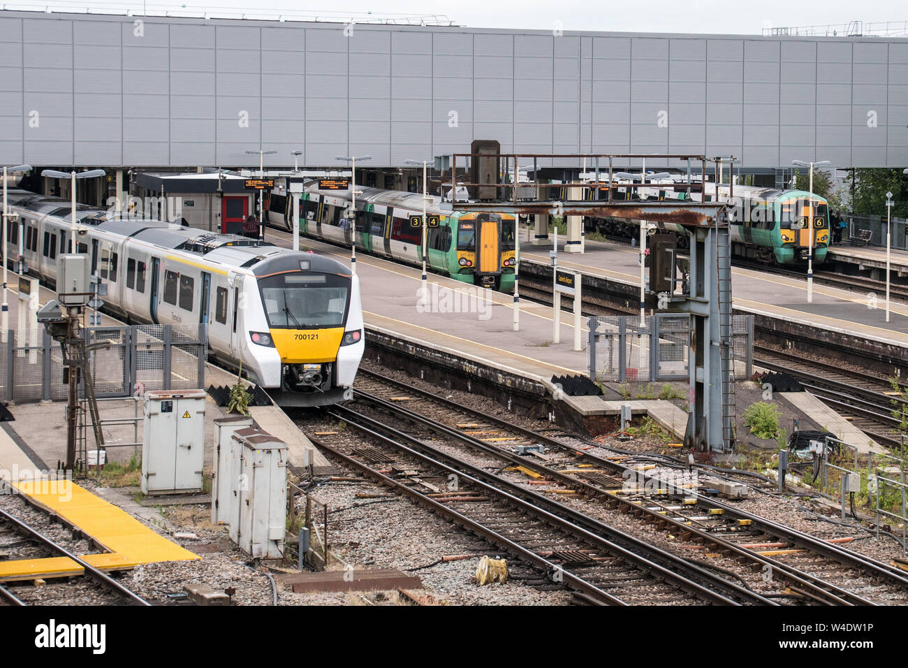 Gatwick airport station top view with Thameslink and Southern trains at