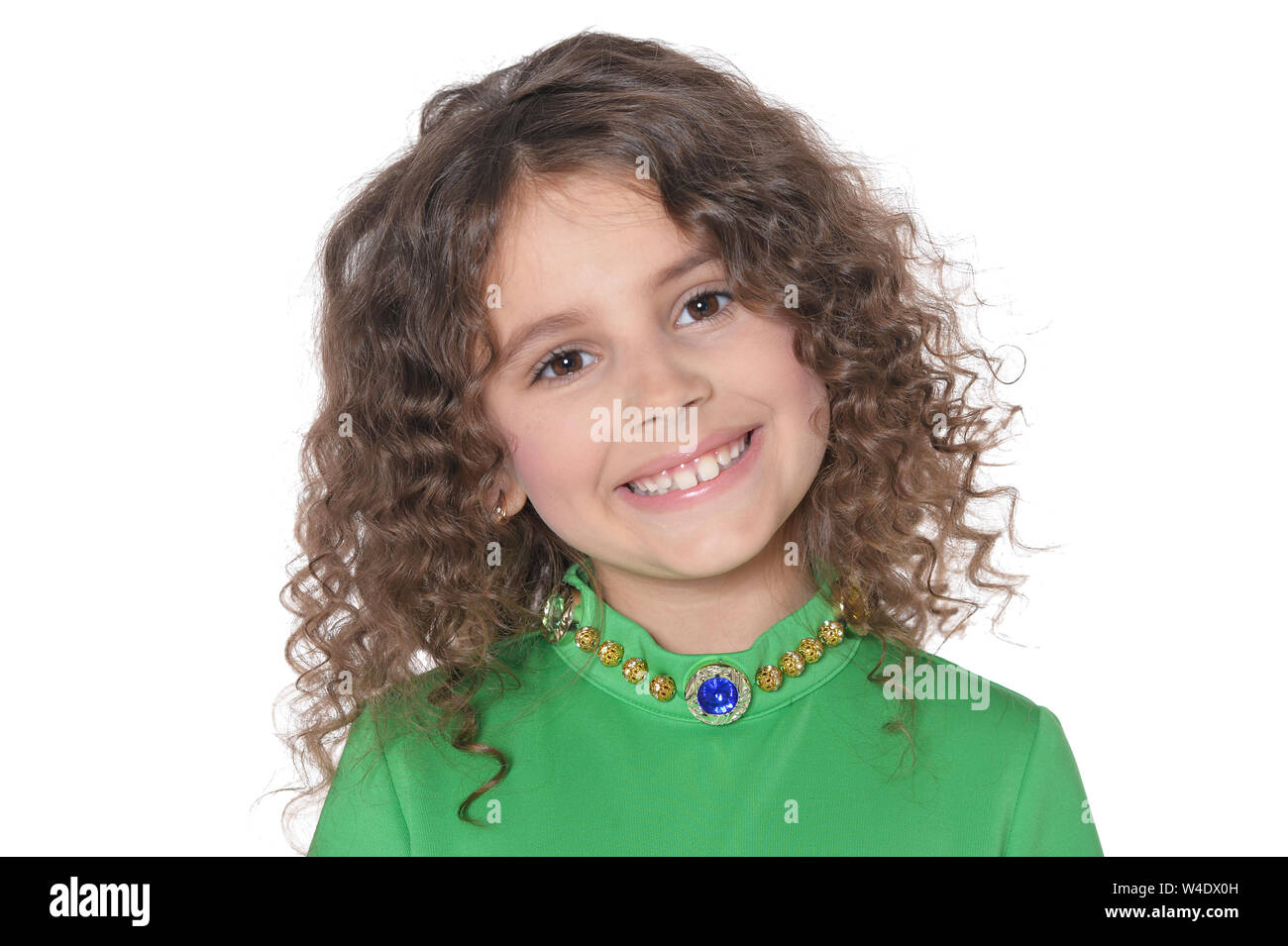 portrait of cute little girl posing in green dress Stock Photo - Alamy