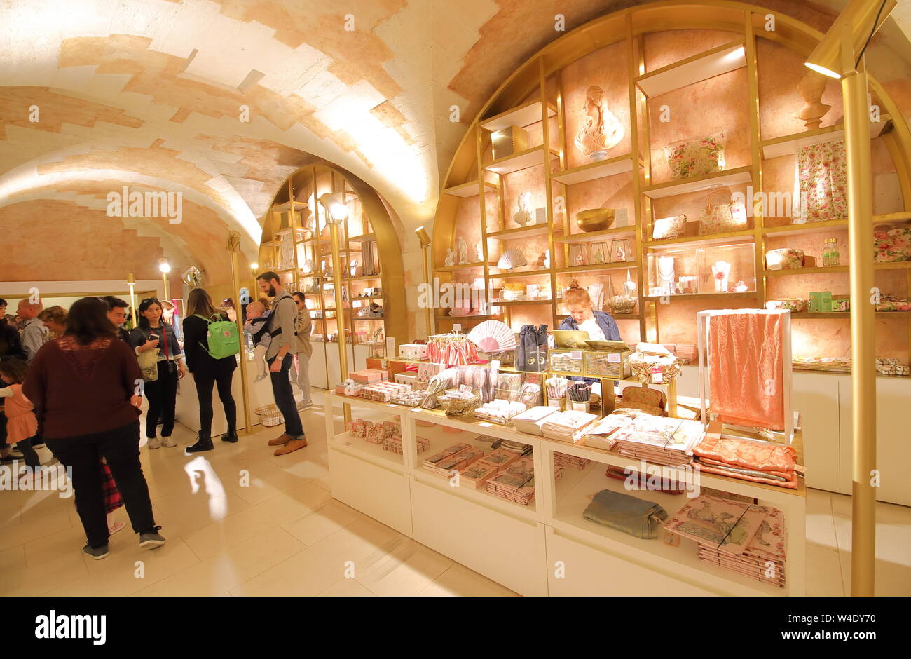 People visit Versailles palace souvenir shop Paris France Stock Photo