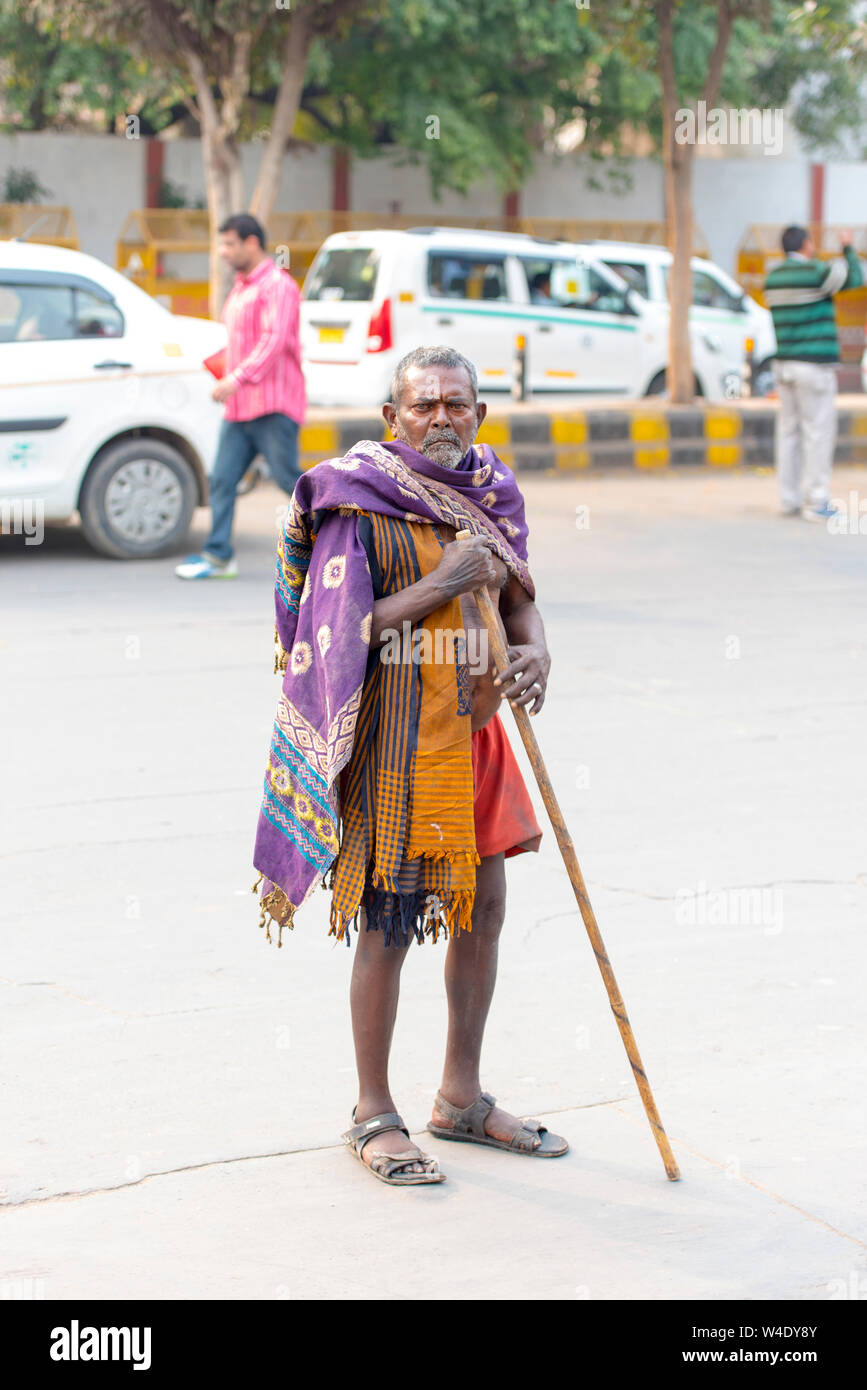 Poor Indian man in a street in New Delhi on February 24. 2018 in India Stock Photo