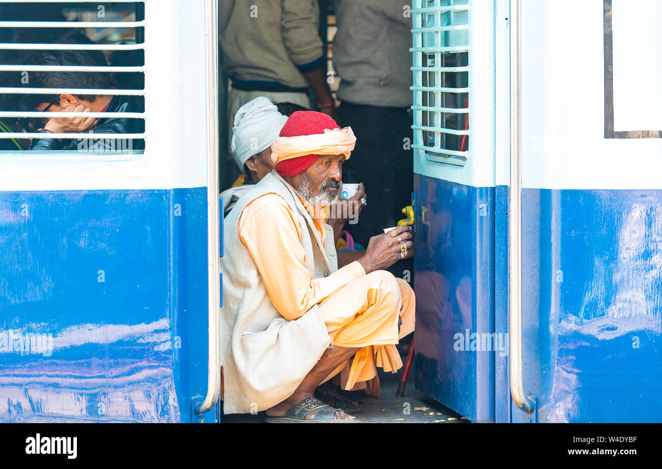 NEW DELHI - FEB 26: Indian Passengers in a train in New Delhi on February 26. 2018 in India Stock Photo