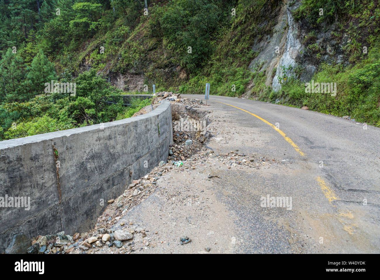 Road damage and reconstruction after an earthquake in Oaxaca state in rural Mexico Stock Photo