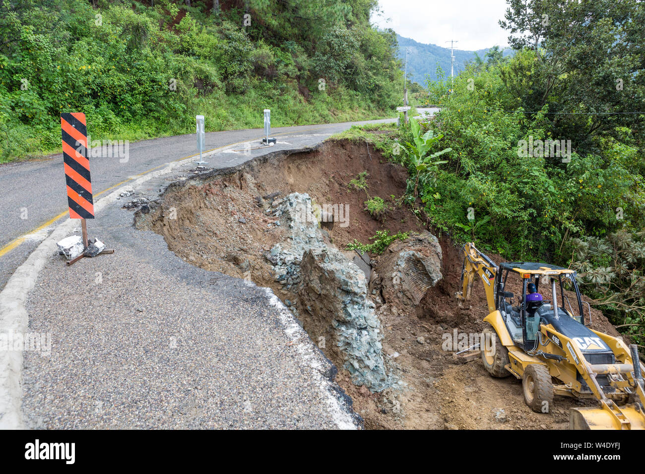 Road damage and reconstruction after an earthquake in Oaxaca state in rural Mexico Stock Photo
