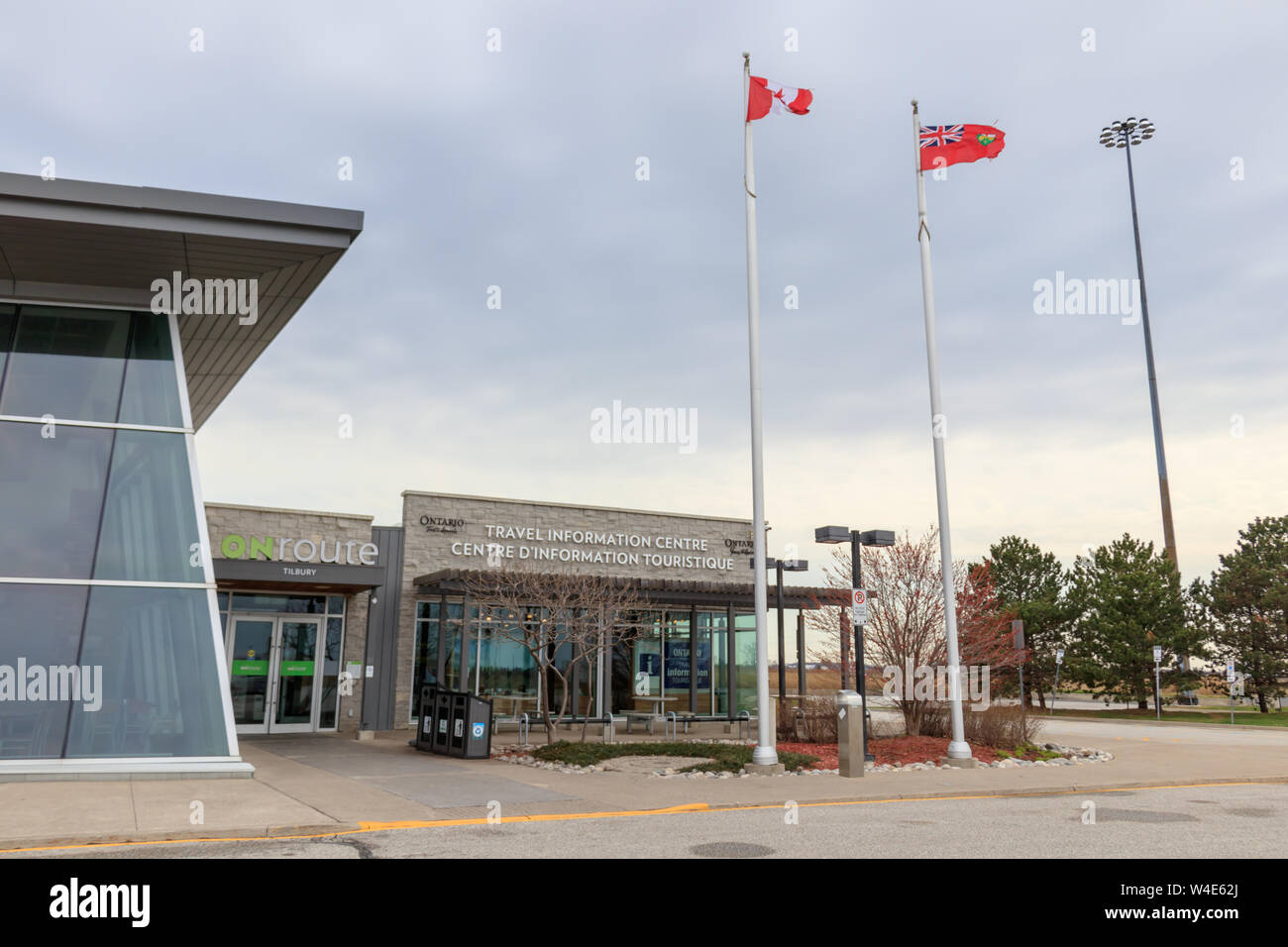 Tilbury ONroute Travel Stop along Ontario 401 Highway, seen with Canadian and Ontario flag. Stock Photo
