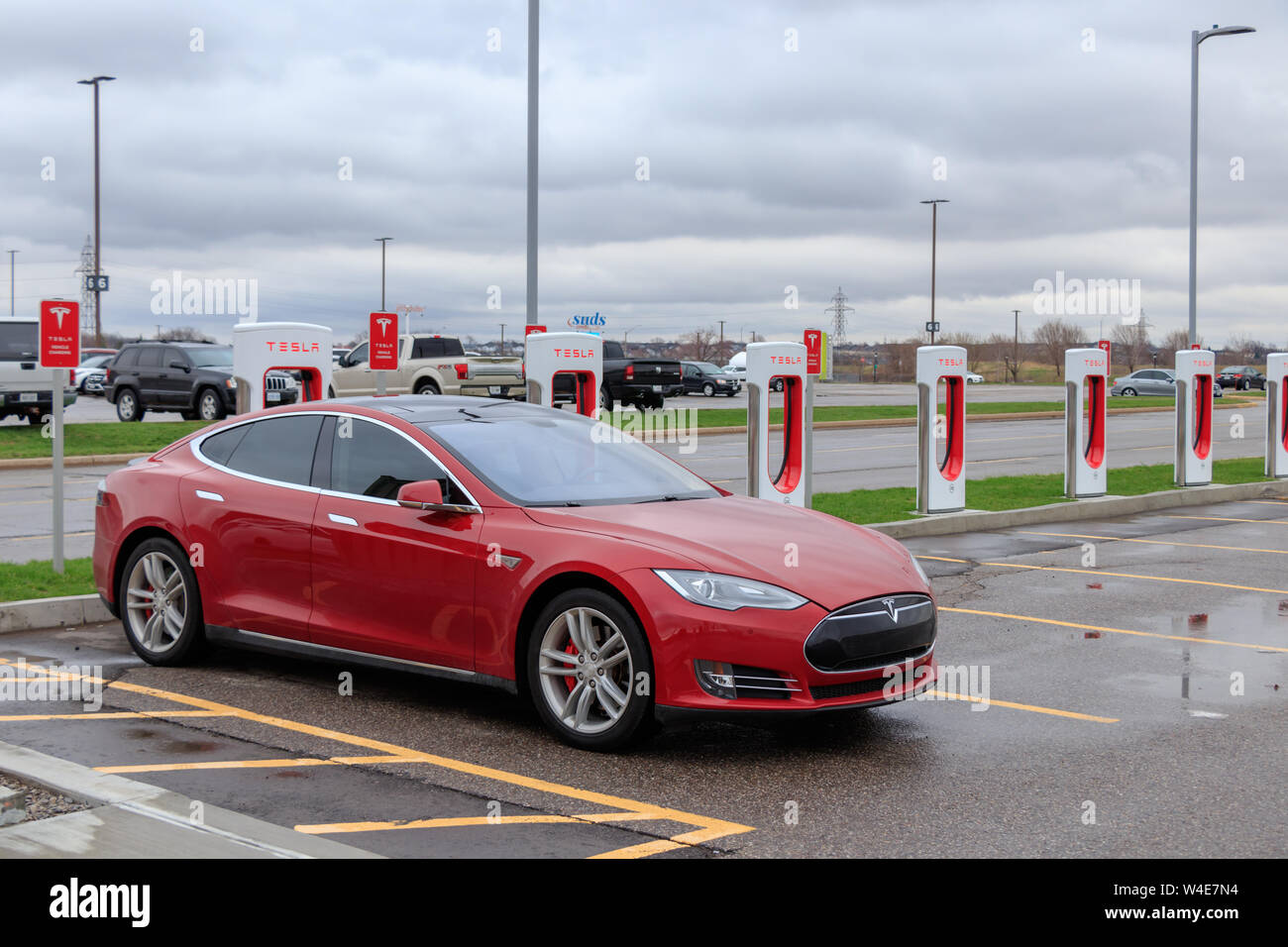 Red Tesla Model S at Tesla Supercharger Station in Hamilton, Ontario Stock Photo Alamy