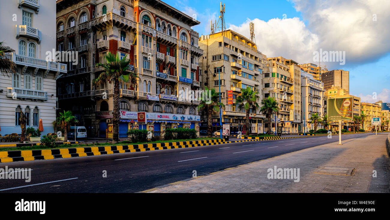 Colorful appartment buildings lining the Corniche in the old town of Alexandria, Egypt Stock Photo