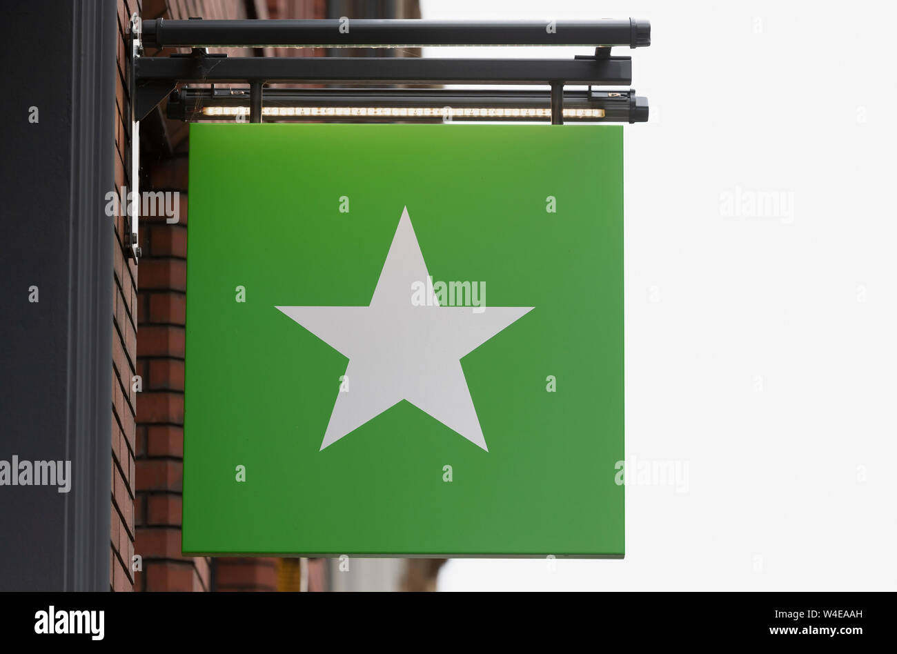 A sign for Veggie Pret hangs from one of the sandwich shop chain's stores in Manchester, UK. Stock Photo