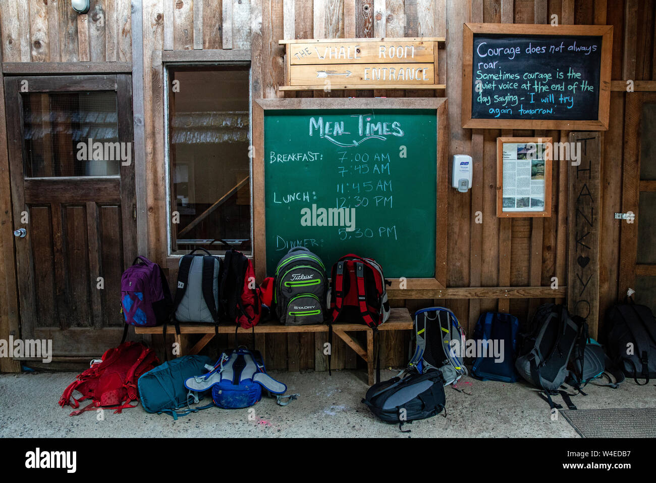 Backpacks outside cafeteria at Strathcona Park Lodge in Strathcona Provincial Park, near Campbell River, Vancouver Island, British Columbia, Canada Stock Photo