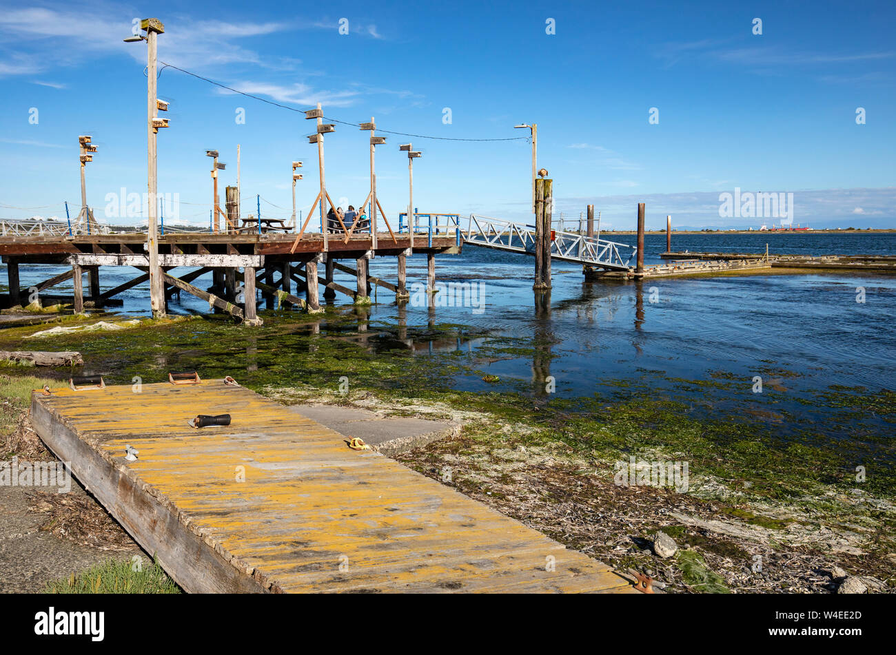 Pier at Royal Roads University on Esquimalt Lagoon, Colwood, near Victoria, Vancouver Island, British Columbia, Canada Stock Photo
