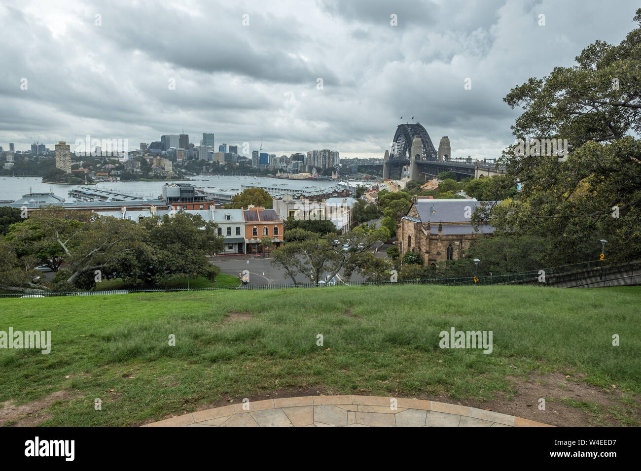 View from Observatory Hill Rotunda, Sydney, Australia looking down over The Rocks and Sydney Harbour Bridge Stock Photo