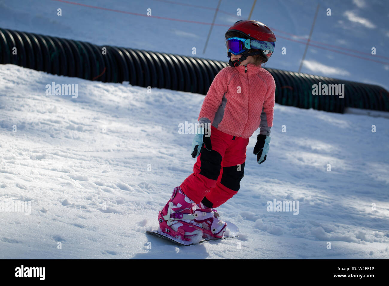 Little Cute 5 Years Old Girl Snowboarding making a Tricks at Ski Resort in  Sunny Winter Day. Caucasus Mountains. Mount Hood Meadows Oregon Stock Photo  - Alamy