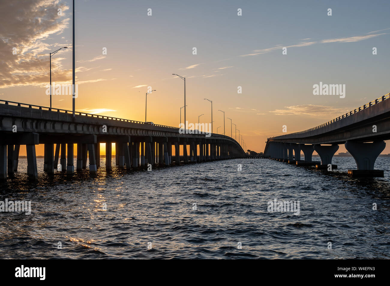 View between two bridges as the sun rises Stock Photo