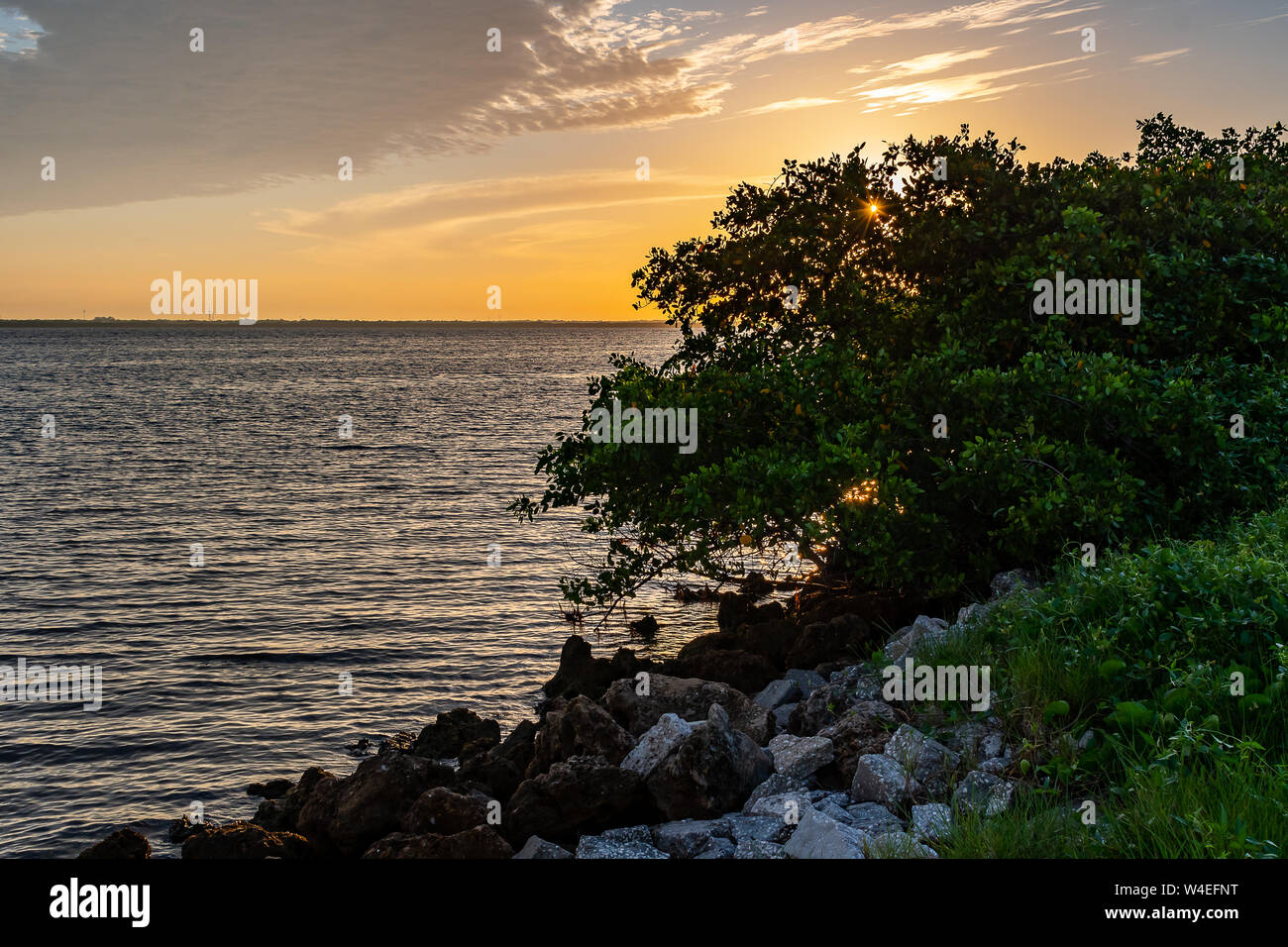 Fishing spot on the Tampa Bay as the sun rises Stock Photo