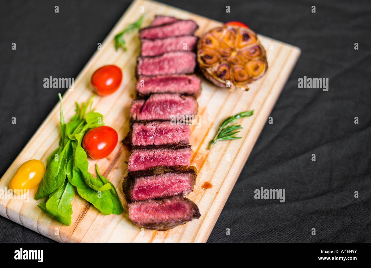 New york strip porterhouse steak beef meat with garnished and spices