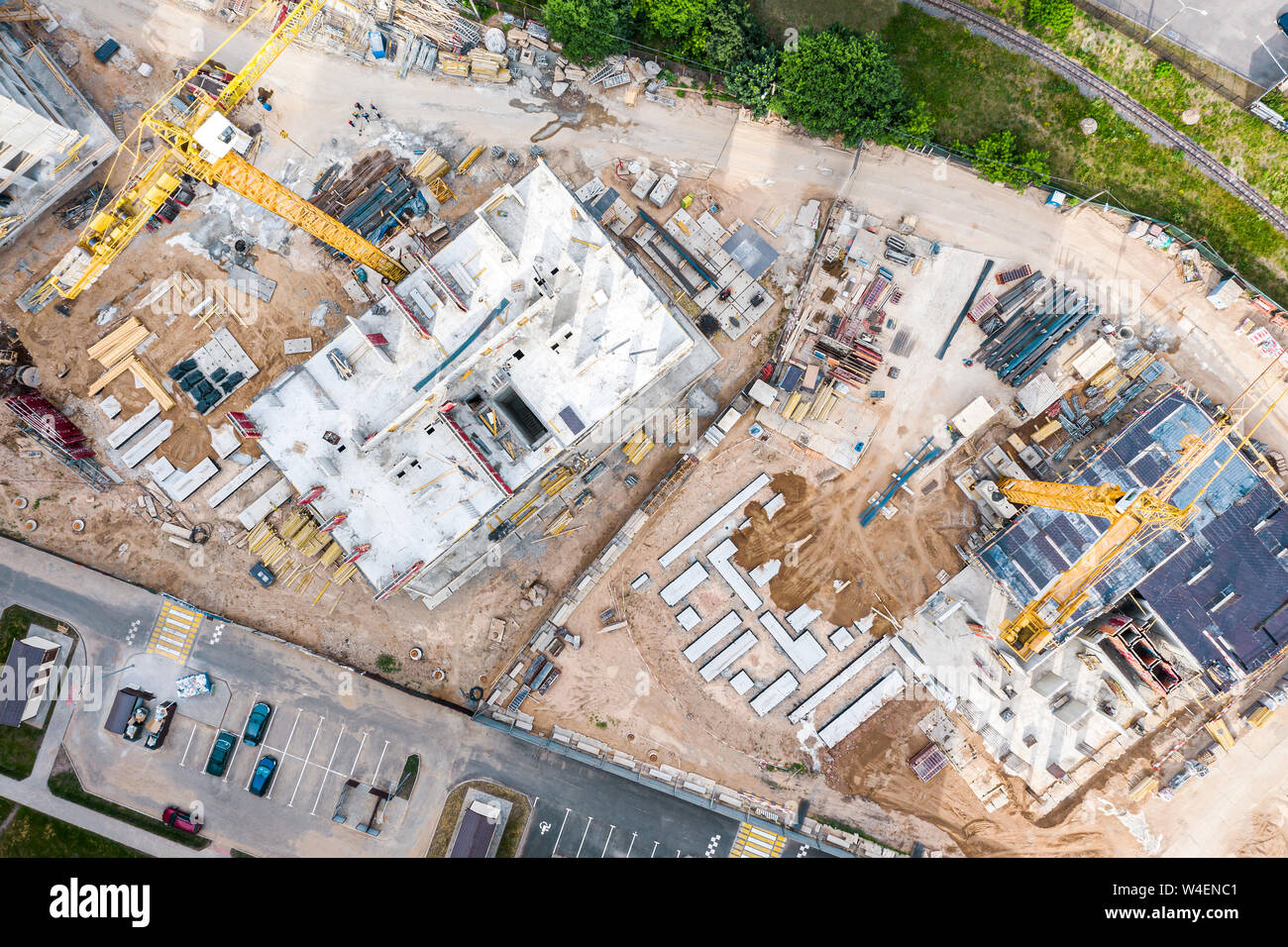 industrial yellow tower cranes working at construction site ...