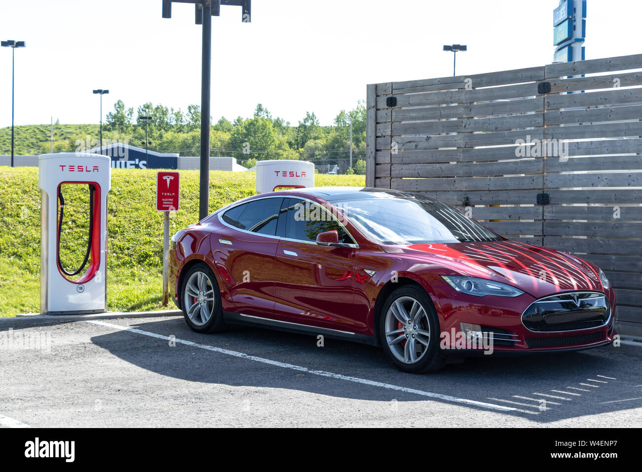 Tesla Model S parked, charging at Tesla's Cornwall, Ontario