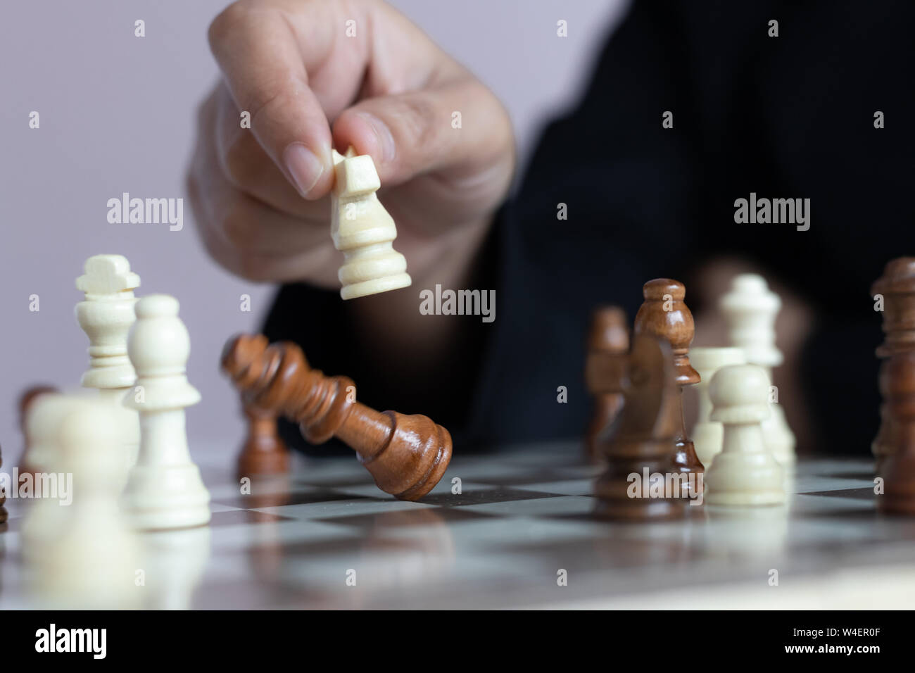 Close Up Shot Hand Of Business Woman Playing The Chess Board To Win By Killing The King Of Opponent Metaphor Business Competition Winner And Loser Sel Stock Photo Alamy