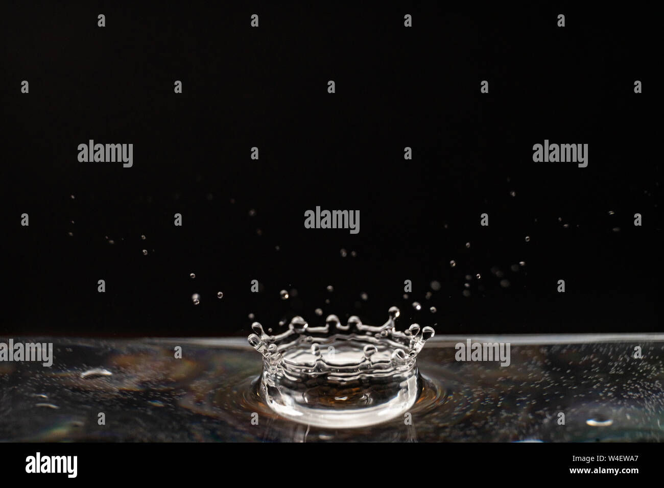 https://c8.alamy.com/comp/W4EWA7/drop-of-water-transparent-water-drop-water-splash-close-up-isolated-on-black-background-a-lot-of-bubbles-liquid-motion-W4EWA7.jpg
