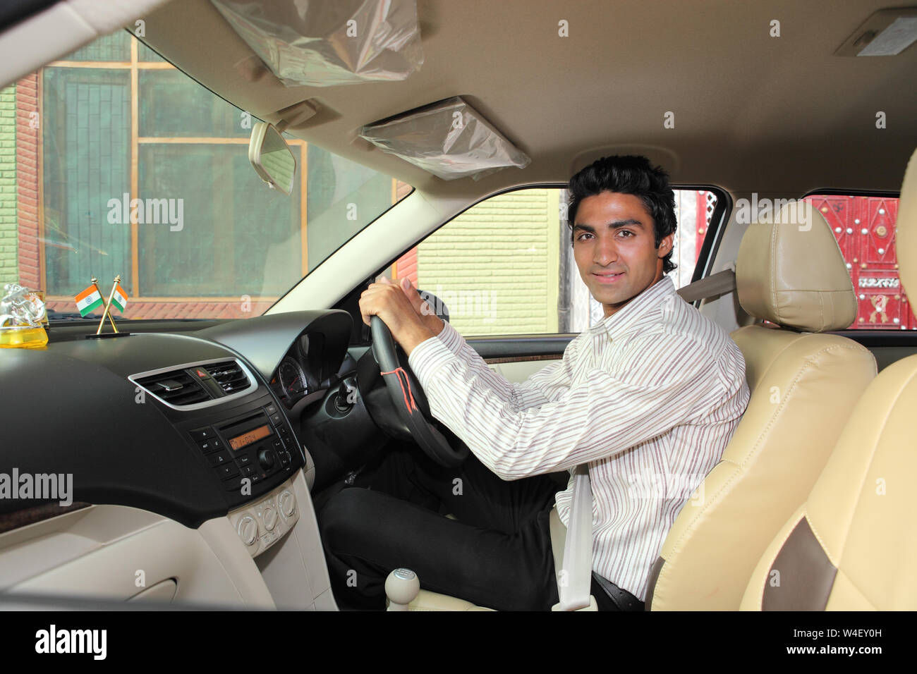 Portrait of a man driving a car Stock Photo