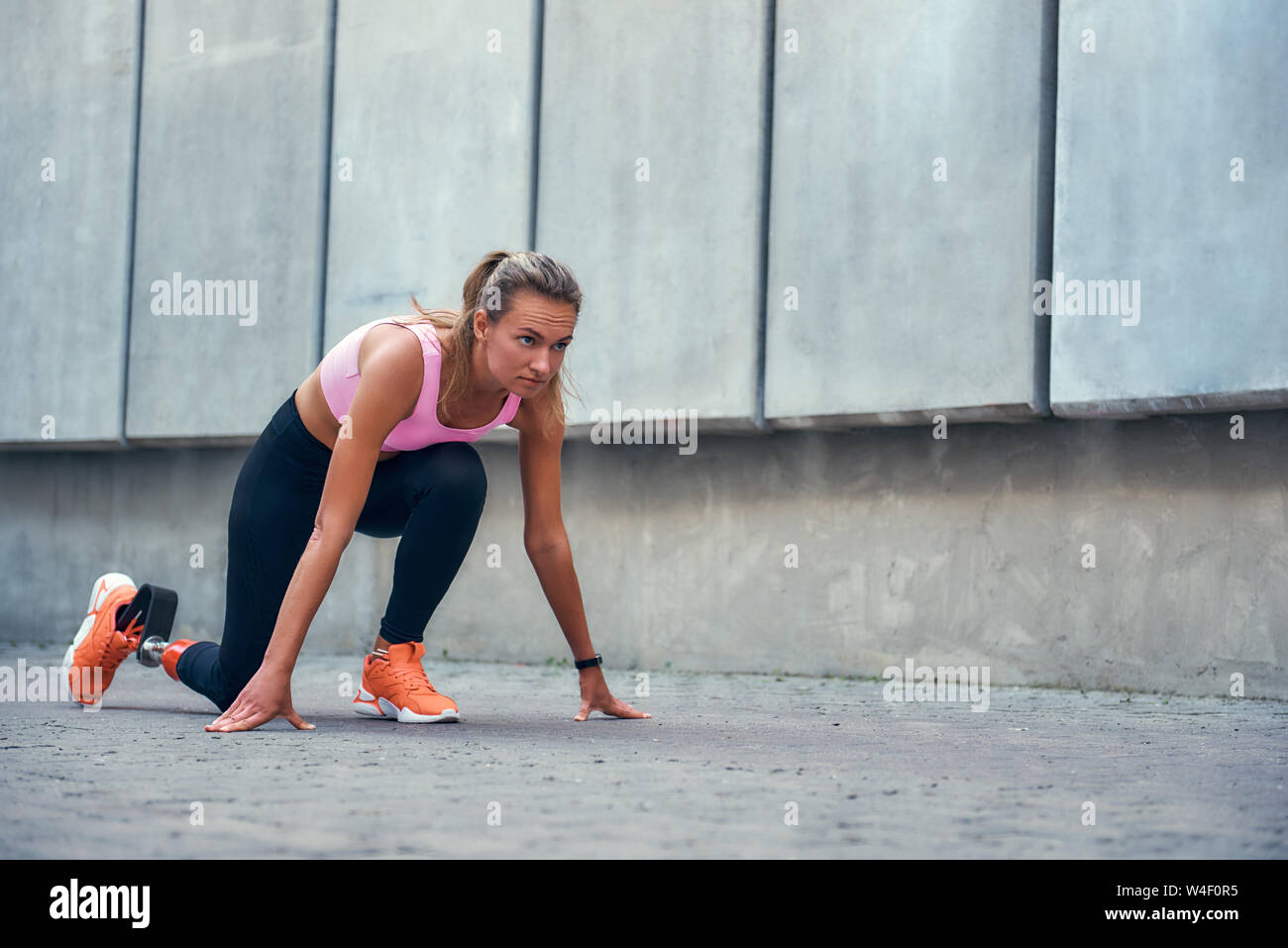 I Am Ready Beautiful Disabled Woman With Leg Prosthesis In Sports Clothing Standing On The Start Line While Running Outdoors Disabled Sport Concept Motivation Healthy Lifestyle Stock Photo Alamy