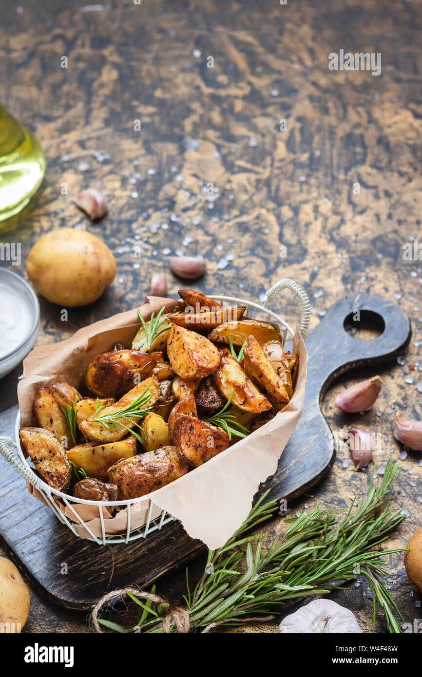 Baked young potatoes in a rustic style with rosemary, garlic and sumac ...
