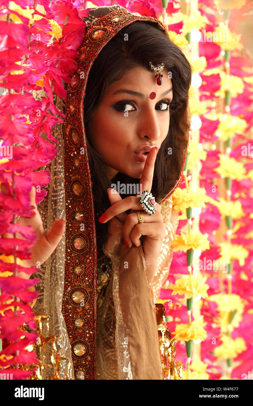 Portrait of a Punjabi Indian bride with a finger on lips Stock Photo ...