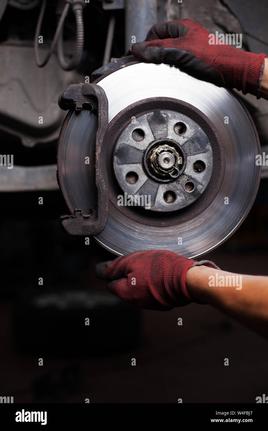 Repairing brakes on car. Changing brake disc Stock Photo Alamy