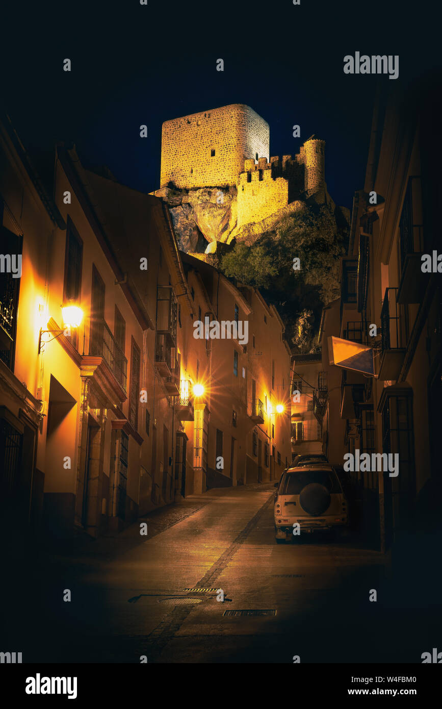 Night view of Olvera street with Castle tower in background - Olvera, Cadiz Province, Andalusia, Spain Stock Photo