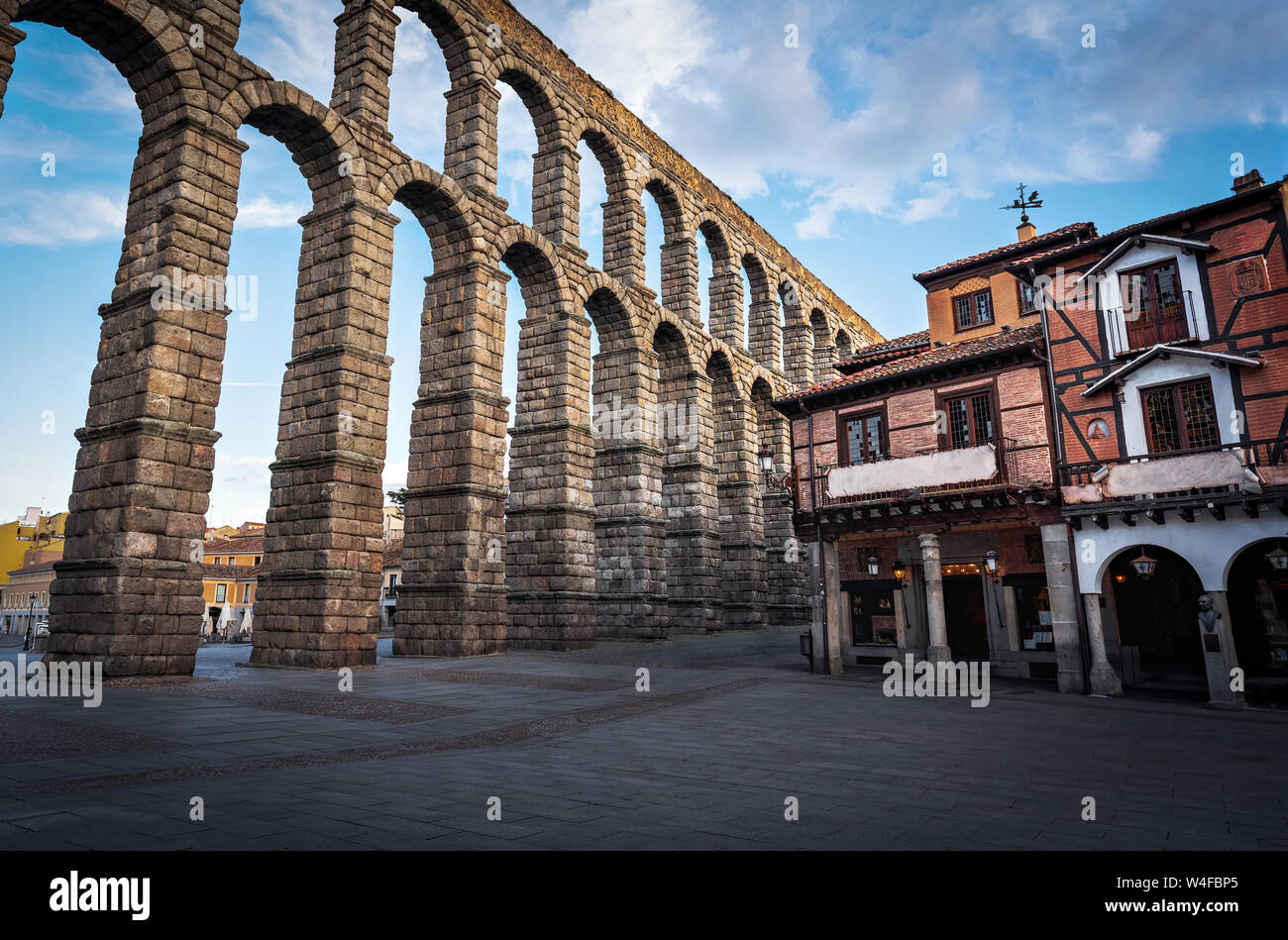 Roman Aqueduct of Segovia and Plaza del Azoguejo square - Segovia, Castile and Leon, Spain Stock Photo