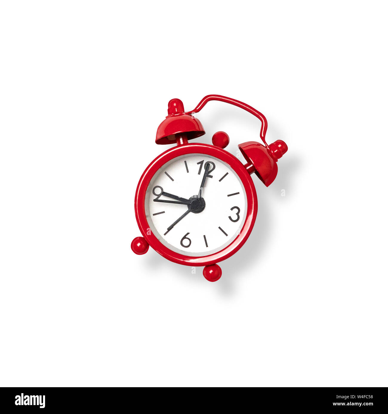 Red alarm clock isolated on white background Stock Photo - Alamy