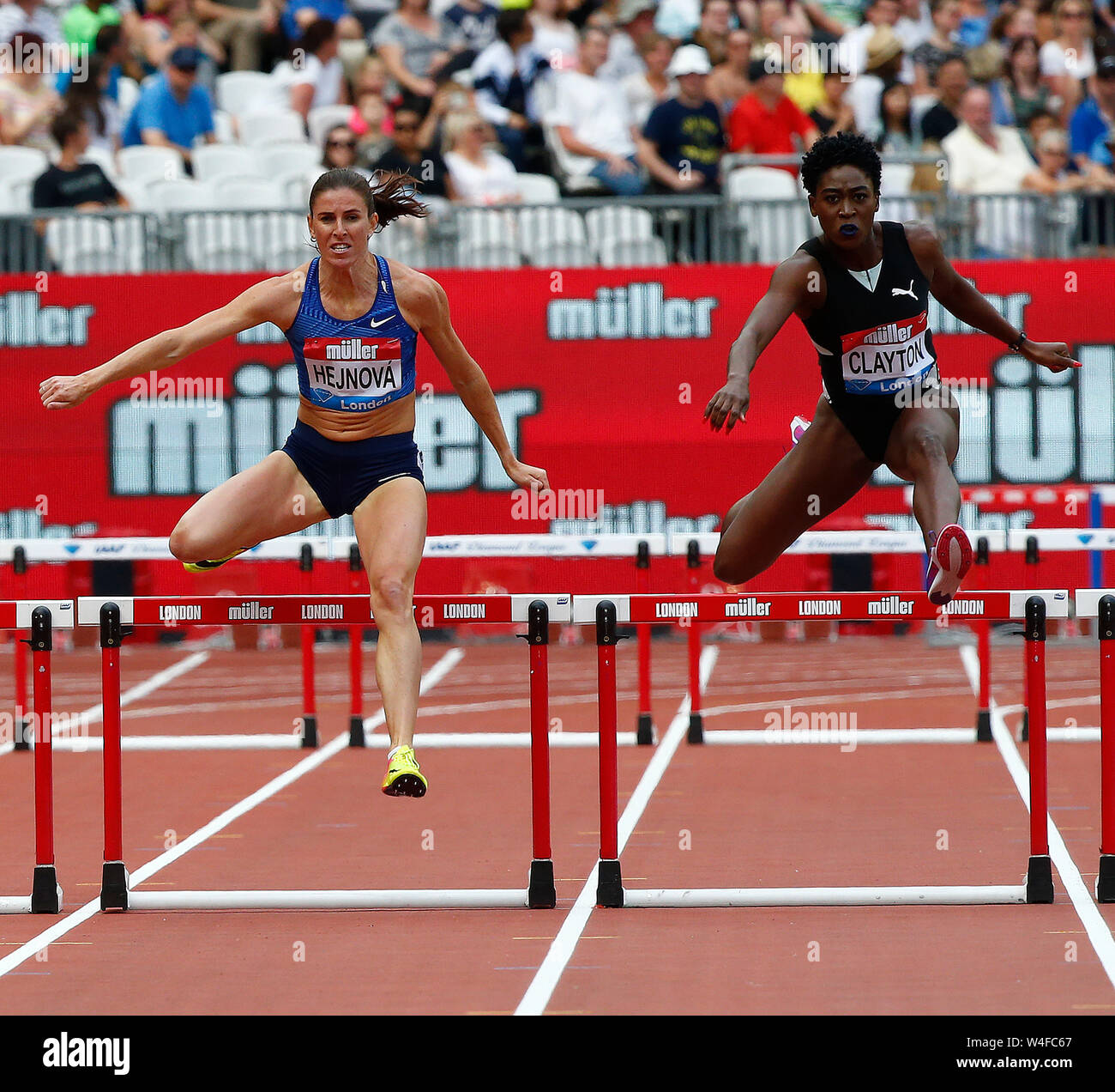 Winner of the 400m hurdles hi-res stock photography and images - Alamy
