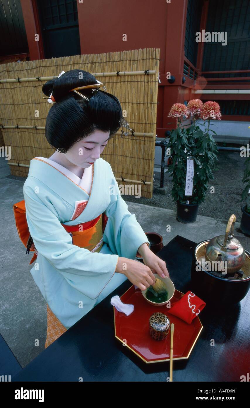 Japan, Honshu, Tokyo, Asakusa, Sensoji Temple, Woman Dressed in Kimono