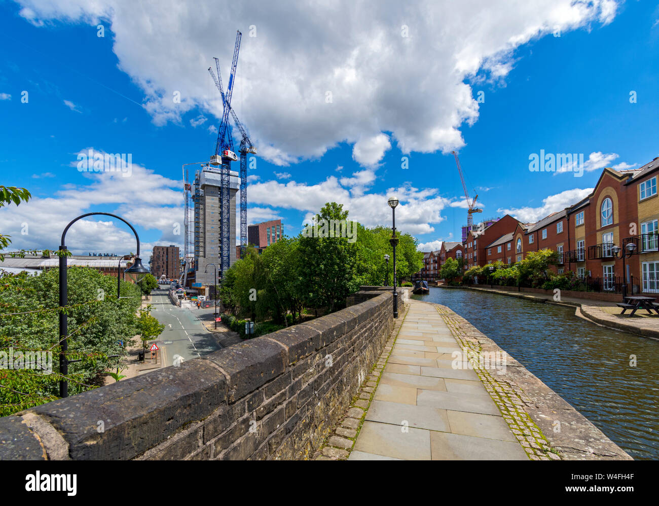 The Oxygen apartment block under construction, June 2019, from the Ashton Canal aqueduct over Store Street, Manchester, England, UK. Stock Photo