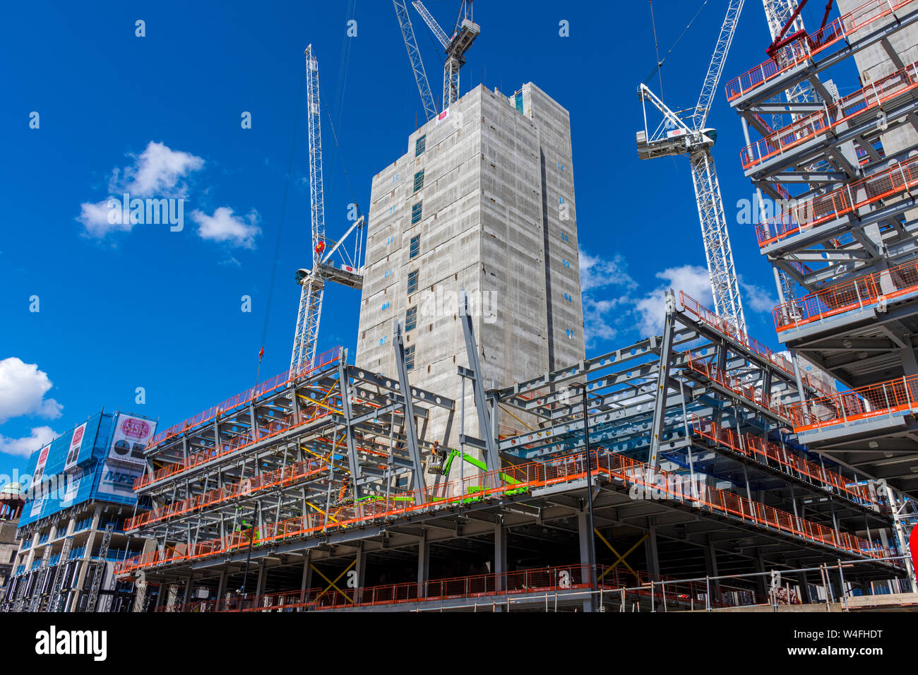 Steelwork and concrete cores at the Circle Square office and residential development, Oxford Road, Manchester, England, UK Stock Photo
