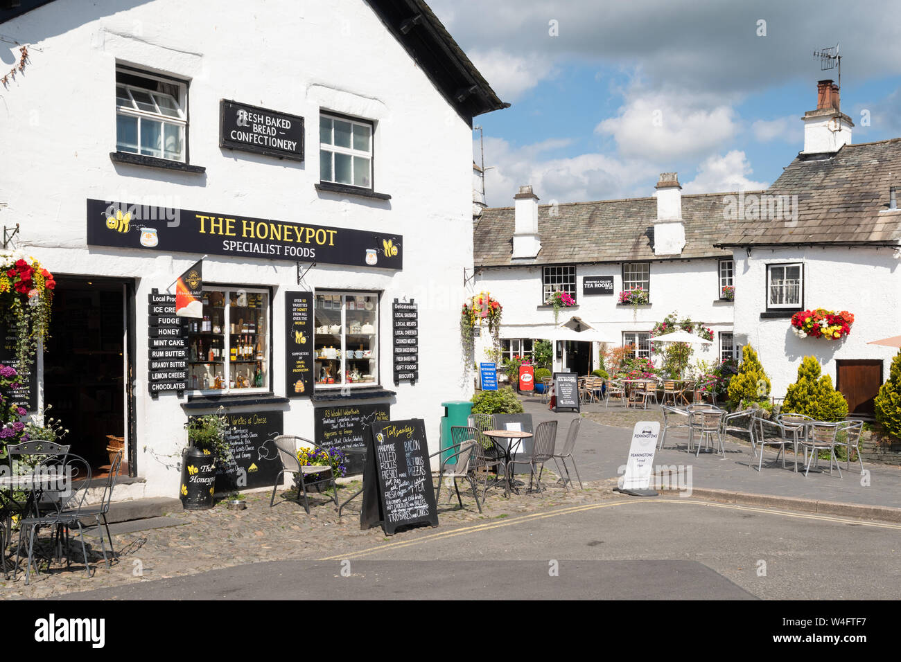 Hawkshead village, The Square, Cumbria, Lake District, England, UK - The Honeypot deli and Minstrels Gallery tea room Stock Photo