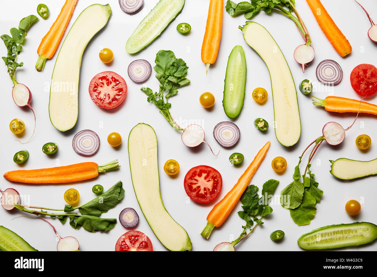 top view of fresh sliced tasty vegetables on white background Stock ...