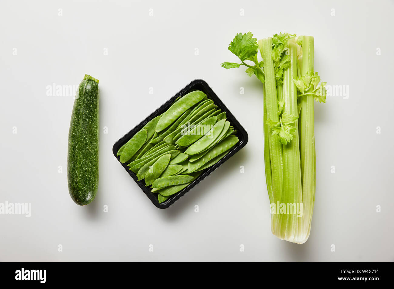 top view of green organic vegetables on white background Stock Photo ...