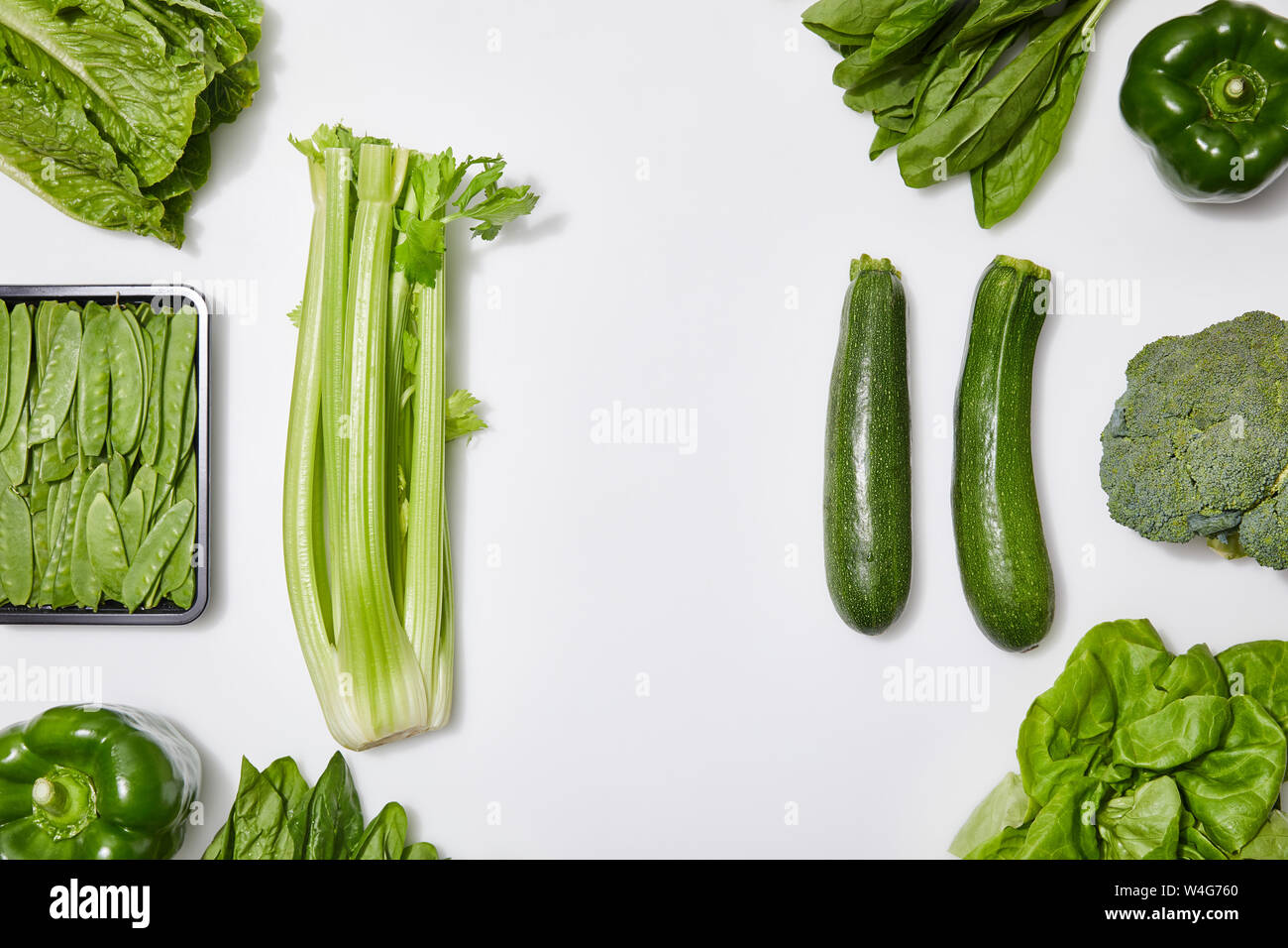 top view of green organic vegetables on white background Stock Photo ...